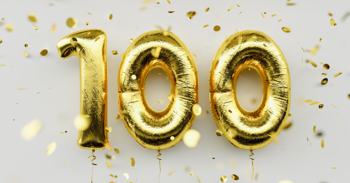 Golden balloon numbers forming '100' with gold confetti falling, symbolizing achieving the milestone of 100 email subscribers for an e-commerce store.